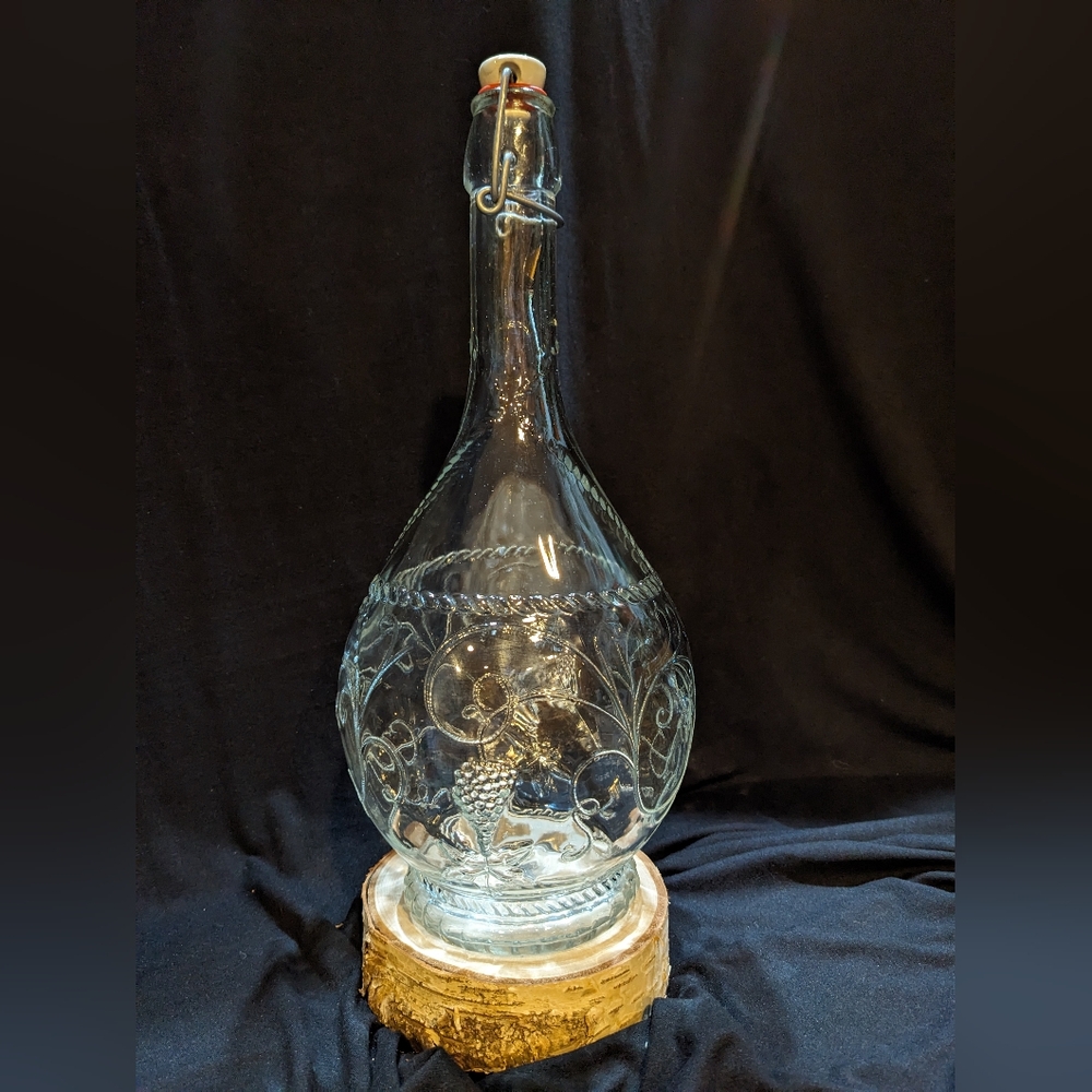 Vintage 1980s grape wine decanter with ceramic and rubber stopper.
